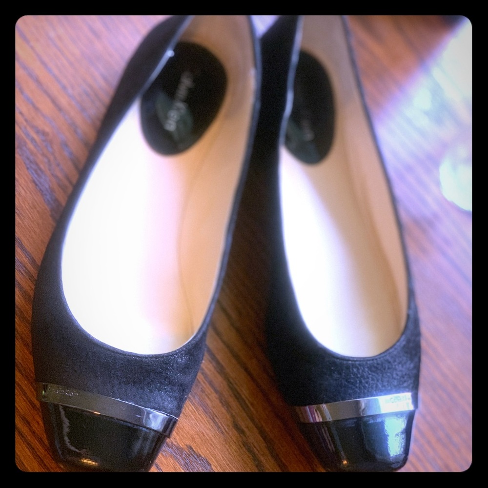 Calvin Klein black flats with patent accents